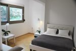 Rock view bedroom with king-size double bed and sofa bed