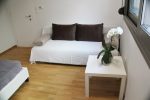 Rock view bedroom with king-size double bed and sofa bed