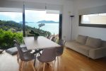 Living room at 1st floor with big dining table and chairs