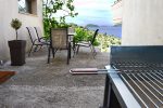 Dining area and BBQ facilities in the courtyard